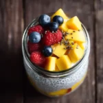 Mango chia seed pudding with yogurt in a jar